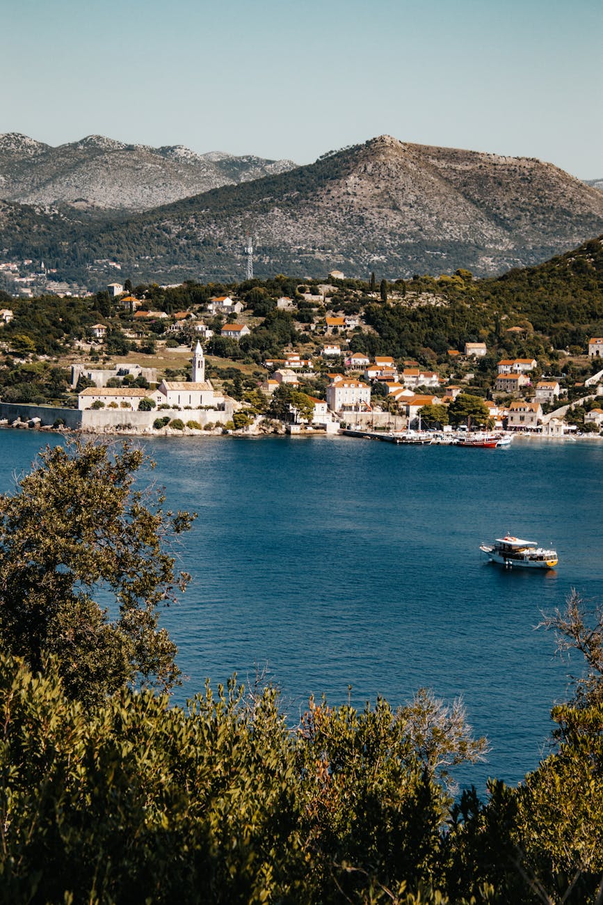 Discover the picturesque coast of Lopud Island, Croatia with its charming village by the Adriatic Sea.