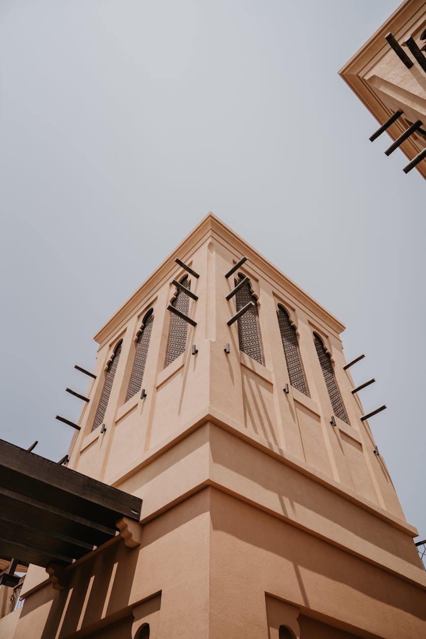A modern perspective of a traditional wind tower showcasing Dubai's architectural heritage.